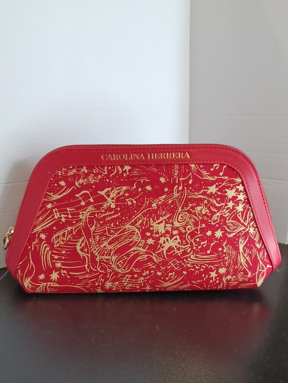 Carolina Herrera Red Zippered Cosmetic Pouch with Gold Musical Print NWOT